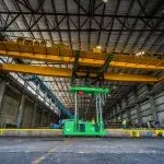 Putting overhead crane on rails with tri-lifter